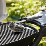 The Premiala Stainless Steel Grill Brush after cleaning a BBQ