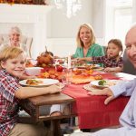 Family eating Premiala turkey dinner